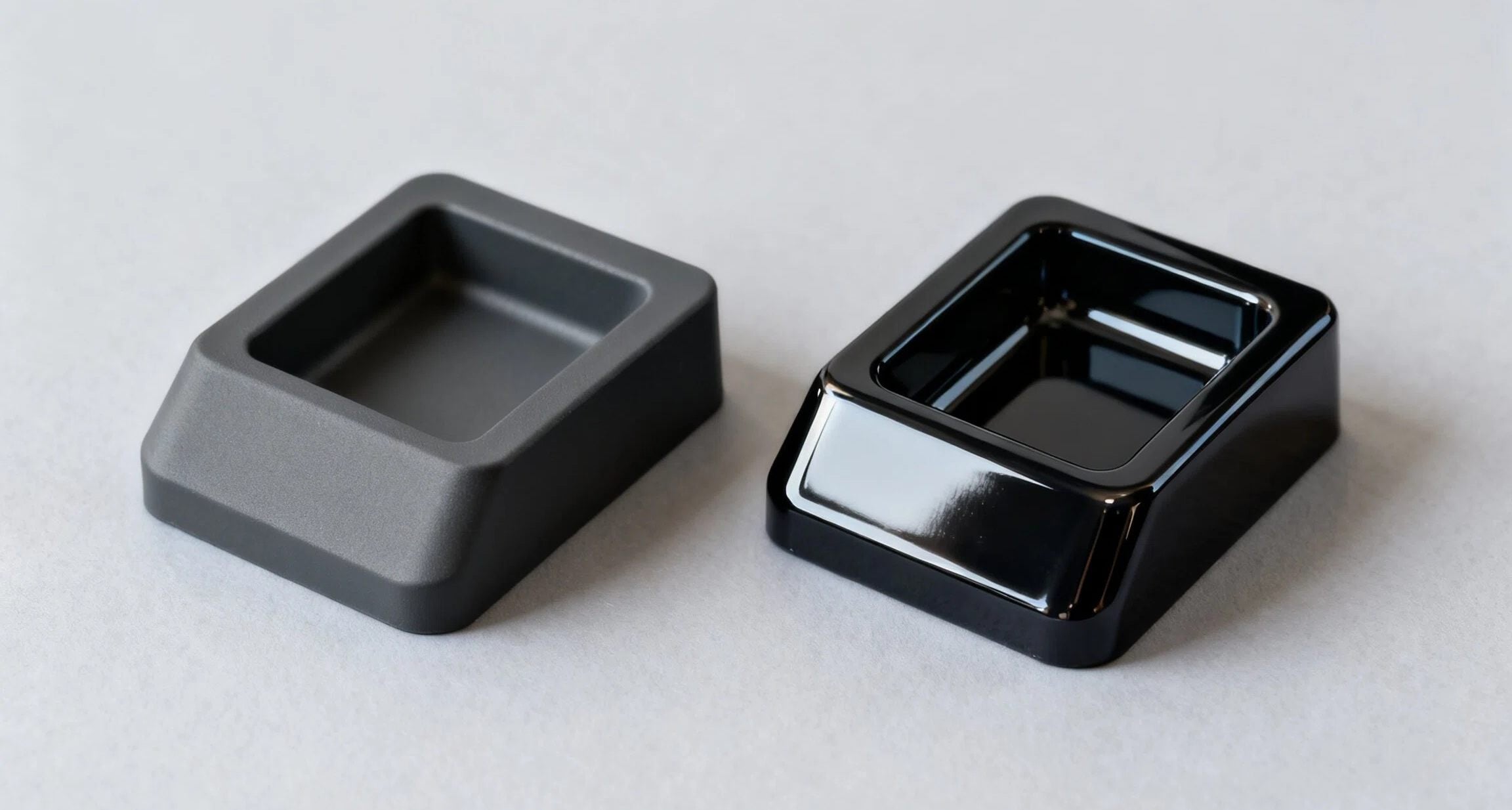 Comparison of dull and high-gloss ABS injection molded parts.